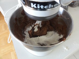 Slowly adding in the flour