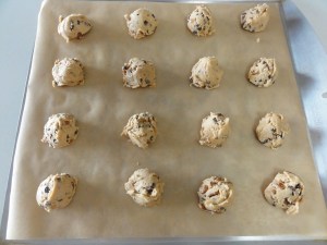 Chocolate chip caramel pecan cookie dough on a sheet